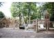 Spacious wooden playground with multiple towers, slides, and climbing structures at 2315 Park Walke Dr, Alpharetta, GA 30009