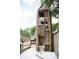 Wooden playground structure with multi-level towers, climbing features and slides at 2315 Park Walke Dr, Alpharetta, GA 30009