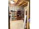 Exposed basement with finished storage and neutral concrete flooring at 526 Blue Mountain Rise, Canton, GA 30114