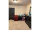 Carpeted bedroom including dresser, bed, and small storage at 526 Blue Mountain Rise, Canton, GA 30114