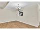 Dining room with wood floors and decorative lighting at 1281 Whitlock Ridge Sw Dr, Marietta, GA 30064