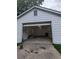 Spacious garage, offering ample room for vehicles and storage at 6977 Eunice Dr, Riverdale, GA 30274