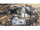 Aerial view of the backyard with a wooden deck, in-ground pool, and white siding of this expansive estate home at 1675 Dodson Sw Dr, Atlanta, GA 30311