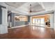 View of the living area highlighting the hardwood floors, large window, and open layout at 1675 Dodson Sw Dr, Atlanta, GA 30311