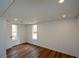 Basement area featuring modern vinyl flooring, white walls, and ample lighting at 493 Willow Springs Dr, Marietta, GA 30068