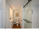 Stylish bathroom featuring white subway tile shower with glass door, modern vanity, and hardwood-style floors at 493 Willow Springs Dr, Marietta, GA 30068