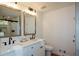 Bathroom featuring a double sink vanity and a glass enclosed shower at 493 Willow Springs Dr, Marietta, GA 30068