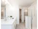 Modern bathroom featuring dual sinks, a glass-enclosed shower, and a separate room for the toilet at 1622 Aiden Way # 62, Conyers, GA 30013