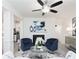 This living room boasts a cozy fireplace, stylish seating, and an open layout perfect for entertaining guests at 1622 Aiden Way # 62, Conyers, GA 30013