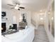 Open-concept living area featuring a fireplace, staircase and abundant natural light creating an inviting atmosphere at 1622 Aiden Way # 62, Conyers, GA 30013