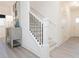 Modern staircase with white railings and black iron spindles at 1622 Aiden Way # 62, Conyers, GA 30013