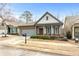 Charming single-Gathering home with a well-manicured lawn and attached garage at 250 High Court Way, Locust Grove, GA 30248