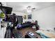 Bedroom with wood floors, a ceiling fan, and large windows at 424 Remington Ct, Villa Rica, GA 30180