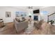 Modern living room with a fireplace, lots of natural light, and hardwood floors at 500 Appalachian Pl, Canton, GA 30114