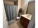 Functional bathroom with a shower, toilet, vanity, and a clean, neutral color palette at 1426 Brookmere Way, Cumming, GA 30040