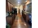 Long and narrow kitchen design with stainless steel appliances, wooden cabinets, and granite countertops at 1426 Brookmere Way, Cumming, GA 30040