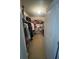 Spacious walk-in closet providing ample storage with organized shelving and hanging space at 1426 Brookmere Way, Cumming, GA 30040