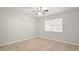 Bedroom featuring neutral walls, carpet, and a ceiling fan with lighting at 3067 Orbit Cir, Ellenwood, GA 30294