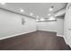 Spacious basement with hardwood floors and recessed lighting at 615 Ceremony Way, Acworth, GA 30102