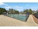 Community basketball court featuring a fenced perimeter and benches, offering residents a space for athletic activities at 615 Ceremony Way, Acworth, GA 30102
