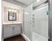 Bathroom featuring modern vanity, mirror, and a tiled glass shower at 615 Ceremony Way, Acworth, GA 30102