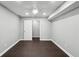 Bedroom with hardwood floors and ceiling fan, connecting to another room at 615 Ceremony Way, Acworth, GA 30102