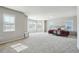 Spacious bedroom with large windows offering abundant natural light and neutral carpeting at 615 Ceremony Way, Acworth, GA 30102
