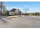 Charming clubhouse with welcoming porch and ample parking, perfect for community gatherings and events at 615 Ceremony Way, Acworth, GA 30102