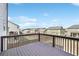 A wooden deck outside with a view of a fenced backyard at 615 Ceremony Way, Acworth, GA 30102