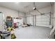 Two car garage with plenty of storage and overhead lighting at 615 Ceremony Way, Acworth, GA 30102