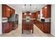 Spacious kitchen features stainless steel appliances, granite countertops, and an island at 615 Ceremony Way, Acworth, GA 30102