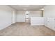 Open upstairs loft area offers versatile living space with neutral walls and cozy carpeting at 615 Ceremony Way, Acworth, GA 30102