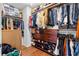 Walk-in closet with custom shelving and rods for maximum storage and organization of clothes and shoes at 2069 Brightleaf Way # 123, Marietta, GA 30060