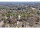 An aerial view of a neighborhood with tree-lined streets at 320 Spyglass Blf, Alpharetta, GA 30022