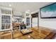 A basement bar area with wine storage, beverage refrigerator, and glassware storage at 320 Spyglass Blf, Alpharetta, GA 30022