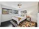 Bright bedroom featuring hardwood floors, two windows and contemporary decor at 320 Spyglass Blf, Alpharetta, GA 30022