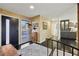 Charming foyer featuring wood floors, neutral walls, and a view of the open floor plan at 320 Spyglass Blf, Alpharetta, GA 30022