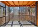 View of a screened porch showcasing the outdoor living space at 320 Spyglass Blf, Alpharetta, GA 30022