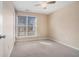 Bedroom with carpet flooring and natural light from the window at 3226 Wellington Sw Walk, Atlanta, GA 30331