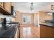 Modern kitchen equipped with granite countertops and stainless steel appliances at 3226 Wellington Sw Walk, Atlanta, GA 30331