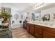 Bright bathroom showcases a double sink vanity and a large, relaxing soaking tub at 236 Augusta Walk, Canton, GA 30114