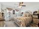 Cozy bedroom with natural light, neutral tones, carpet, and a ceiling fan at 236 Augusta Walk, Canton, GA 30114