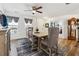 Elegant dining room with a rustic table, upholstered chairs, and stylish decor at 236 Augusta Walk, Canton, GA 30114