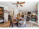 Inviting breakfast nook with a round table and comfortable seating, open to the living areas at 236 Augusta Walk, Canton, GA 30114