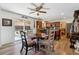 Cozy breakfast nook off kitchen featuring a round glass table and sliding door to the backyard at 236 Augusta Walk, Canton, GA 30114