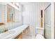 Bathroom featuring a sink with cabinet, commode, and shower at 2570 Bradford Ne Sq, Atlanta, GA 30345