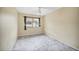 Bedroom featuring neutral walls, tile floor, and a ceiling fan at 2570 Bradford Ne Sq, Atlanta, GA 30345