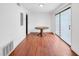 Dining room with wood-look floors, light walls, and sliding glass doors at 2570 Bradford Ne Sq, Atlanta, GA 30345