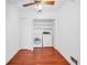 Convenient laundry closet with washer and dryer and overhead lighting at 2570 Bradford Ne Sq, Atlanta, GA 30345