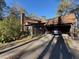 Exterior shot of house with carport and mature trees providing shade at 3121 Bonds Lake Nw Rd, Conyers, GA 30012